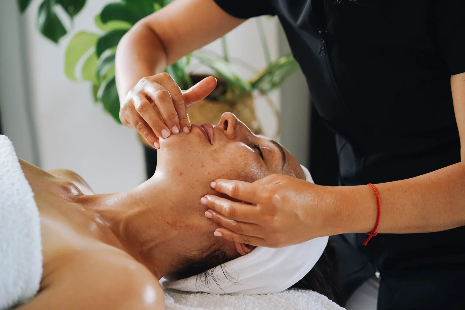 Esthetician giving a facial massage